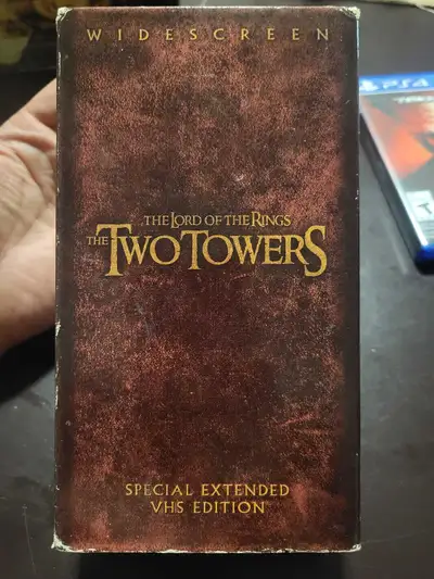 Relive the epic adventure with The Lord of the Rings: The Two Towers Special Extended VHS Edition!,...
