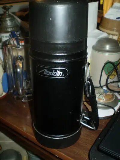 NO TEXT LANDLINE ONLY Black painted stainless steel body. Heavy. "Aladdin reg STANLEY reg 96 Nashvil...