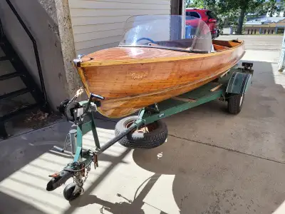 1954 Peterborough Zephyr 14' cedar boat. Includes the original 1956 7.5Hp Sea-horse Johnson motor an...