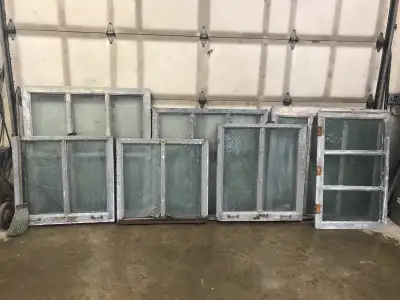 7 vintage windows from old steel Hydro building. Beautiful patina on them. Frames are heavy galvaniz...