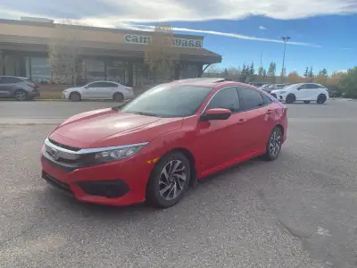 Selling my 2017 Honda Civic EX (Red) a super reliable 4-door sedan with 135,000 km on it. If you kno...