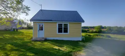 Private 2-bedroom home in peaceful rural Sturgeon, Prince Edward Island. Full bath, kitchen (fridge/...