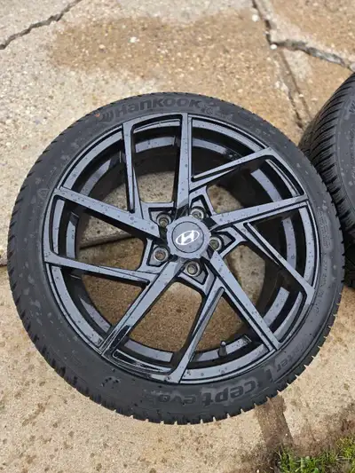 Selling my set of a beautiful set of 4 Hyundai sports MAGS and HANKOOK winter tires. This set will c...