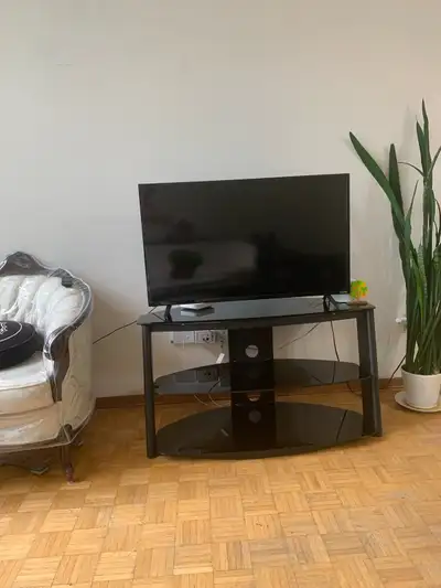Tv stand with Tv, View more