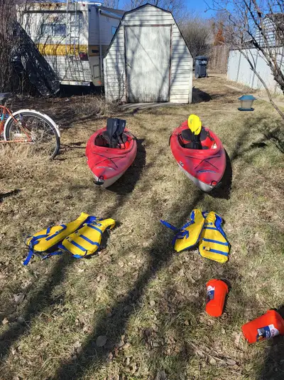 2 Pelican Summit 100 Kayaks for sale. Comes with 2 large adult PFDs and paddles. PFDs are like new....