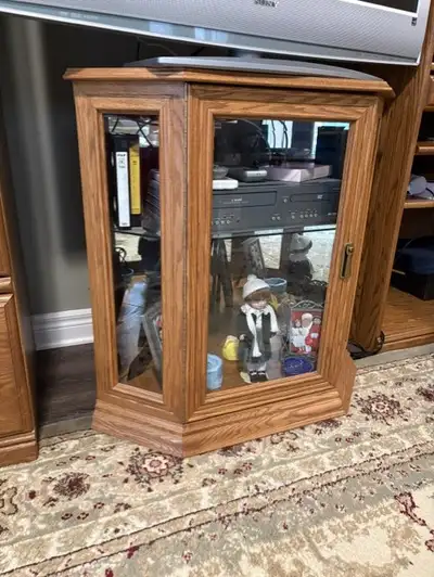 Solid oak corner curio cabinet., View more