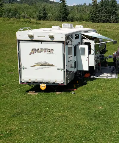 Very clean and ready to go 2010 Toy Hauler. 2 bathrooms, 2 queen beds in garage that come down, quee...