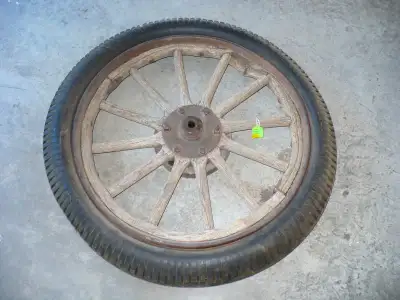 $100 each or Best Offer 2 Very Old Model-T Tires w/rim; Wood Spokes are original