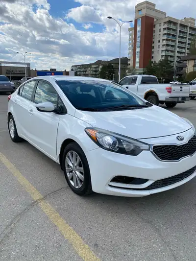 Selling my 2014 Kia Forte LX with 156, 000+ km. The car runs great, is very fuel efficient, and has...