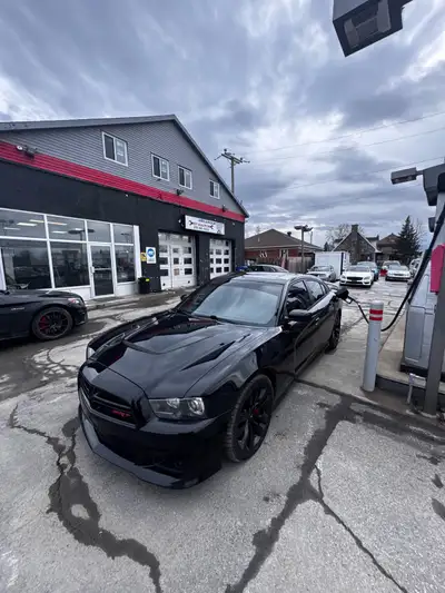 Beautiful mopar for sale, runs great looks mean and sounds aggressive. Looking to sell to put in my...