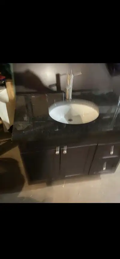 Solid wood CABINT with granite counter and sink .. high end brushed Chrome faucet. Cash only