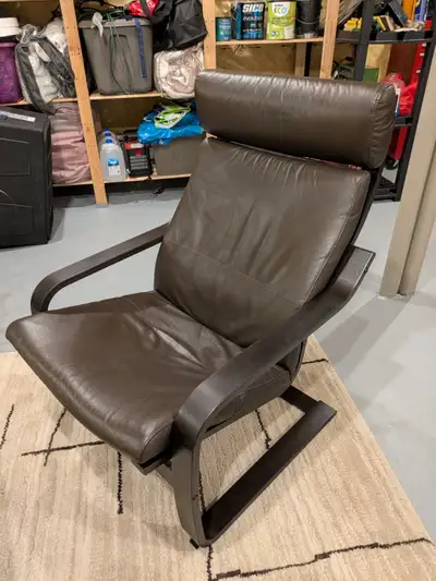 Brown leather Poang Ikea chair