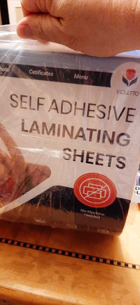 Self adhesive  laminating sheets