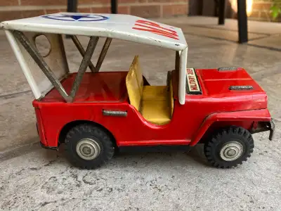 Tin military jeep measures 8 inches in length Made in Japan Friction mechanism working View all phot...