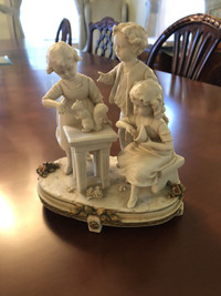 Antique biscuit porcelain small statue of children playing