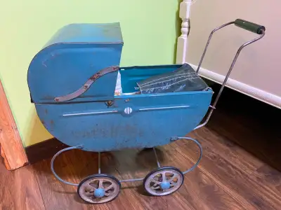 Antique metal doll stroller from the 1940's - 1950's