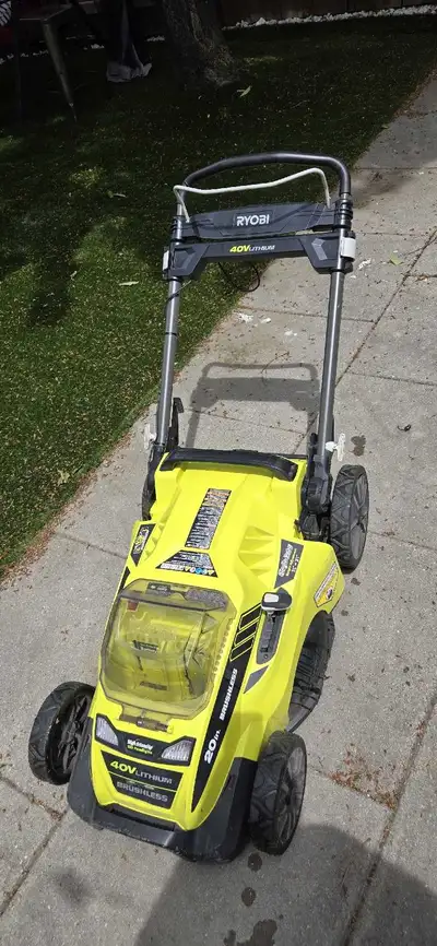 Royobi cordless lawnmower., View more