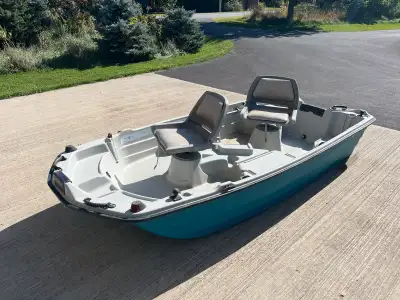 Fun little plastic 10 foot fishing boat. Can take a small outboard. Has two ram mount preinstalled a...