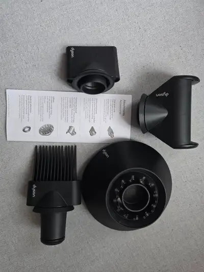 Brand NEW, never used set. This set includes multiple attachments for your Dyson hair dryer. It come...