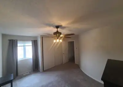 Bright, spacious upstairs room with a unique curved wall in a clean, respectful shared family home....