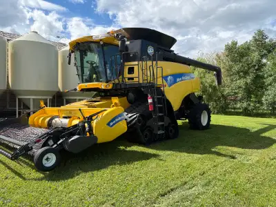 Selling a 2014 cr 9080 Has tracks and rear wheel assist as well Selling because upgraded to a bigger...