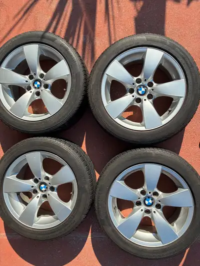 Upgrade your ride with this set of four BMW 17-inch alloy wheels paired with Continental PureContact...