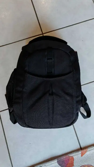 Backpack for DSLR camcorder camera. Customizable compartments (velcro). Laptop or tablet compartment...