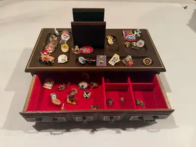 Showcase your collection in style with this elegant wooden display case, perfect for organizing and...