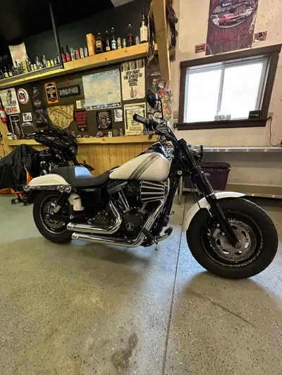 2017 Harley Fat Bob only 15700km, I am the second owner the bike comes with an extra seat and a vanc...