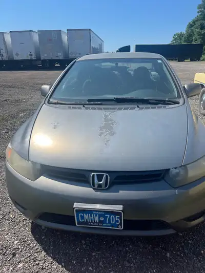 2007 Honda civic, there is sun fading and some cosmetic damage but would be great as a starter car o...
