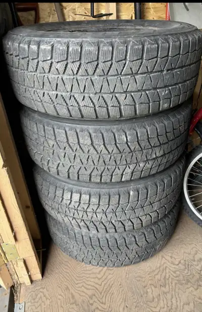 Selling Bridgestone Blizzak winter tires on rim measures 8/32 lots of tread left wife has accident a...