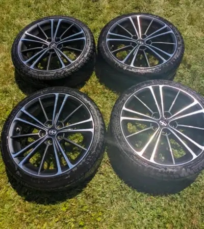 I am selling a set of four Scion FR-S wheels that fit models from 2013 to 2016, each featuring a 5-l...