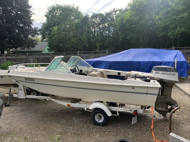 Boat motor and trailer in Powerboats & Motorboats in St. Catharines