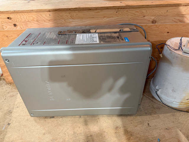 Noritz 199k btu on demand water heater. like new. used 5 years. in Heaters, Humidifiers & Dehumidifiers in Kenora