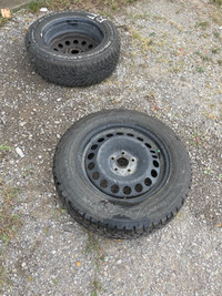2 Goodyear winter tires and rims