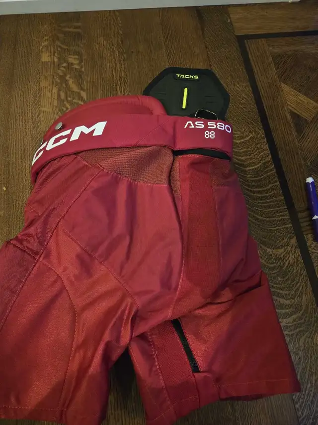 Red hockey pants. Jr M Jr L in Hockey in City of Toronto - Image 3