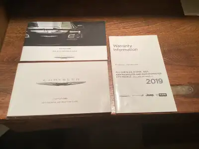 3 booklets for a 2019 Chrysler 300 Essential Information Guide, Quick Reference Guide, Warranty Info...