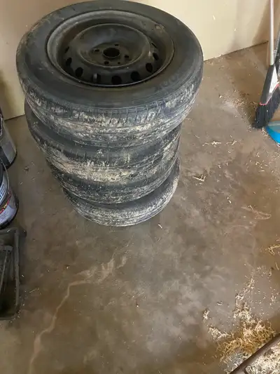 Set of Hankook Optimo Tires with Rims. P175/70 R14. All Season tires. About one season left on tires...