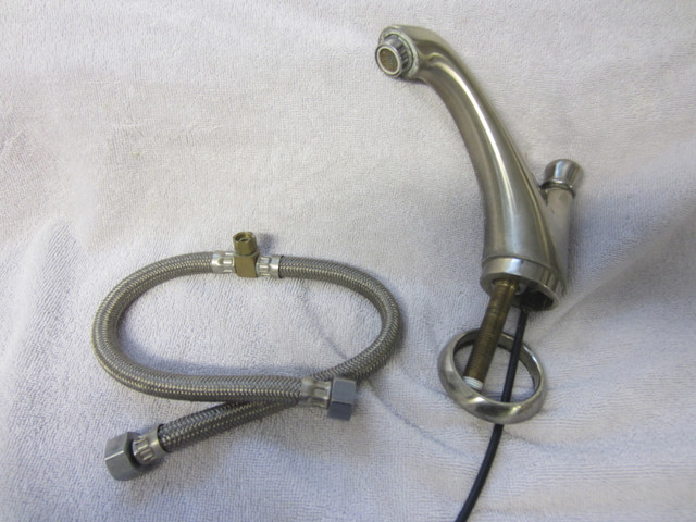 American Standard Bathroom Faucet (and Hot/Cold connector) in Plumbing, Sinks, Toilets & Showers in Kingston