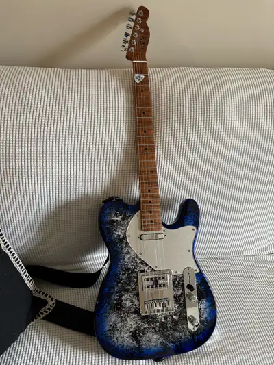 This is a customs Tele with all highend parts and electronics. CTS 500k pots with an orange drop tre...