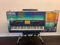 Yamaha electric keyboard PSR-330. Stand and stool included.