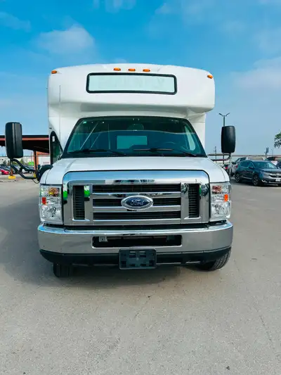 Airport shuttle bus. Our shuttles are configured with perimeter style seating; however, the seating...