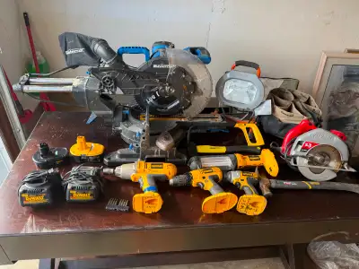 Have a set of tools for sale, sliding compound miter saw, Dewalt drills with battery, skilsaw, proje...