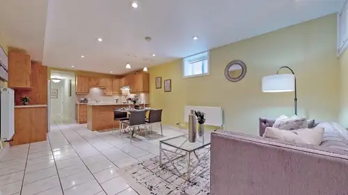 College/Concord 2-bedroom, bright immaculate basement, with 8.5 ft ceilings, portion above grade, in...