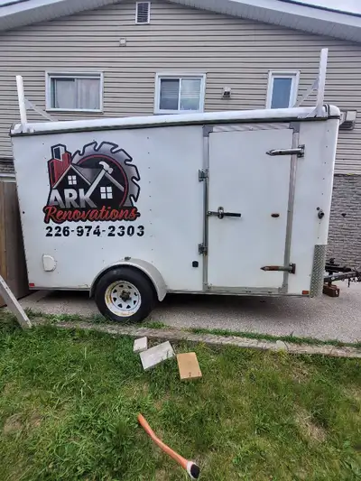 Selling 6x12 enclosed cargo trailer. Solid frame. Rear ramp door. Side man door. Ladder racks on roo...