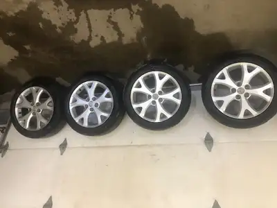 5 x 144.3 bolt pattern. 67.1 center hole. Rims are decent but some scratches and chips, Tires have 1...