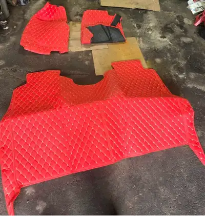 Custom fir red diamond stitch floor mats for 13th generation F150. I traded the truck before install...