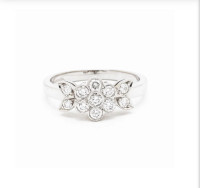 Platinum Tiffany & Co. "Blossom" diamond flower engagement ring.