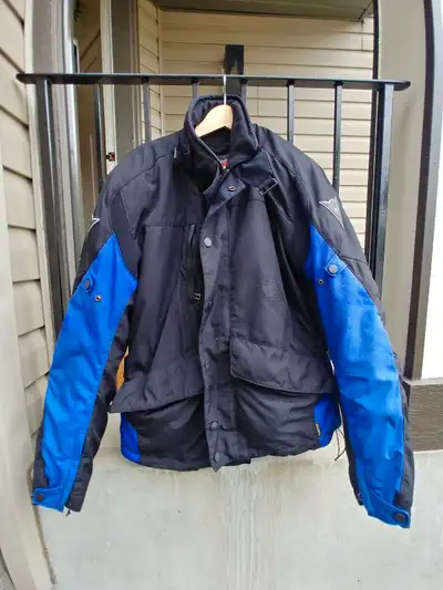Selling a used Dainese motorcycle jacket, perfect for riders looking for protection and style on the...