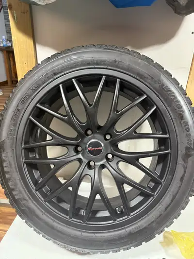 Almost new winter tires and rims 5x112